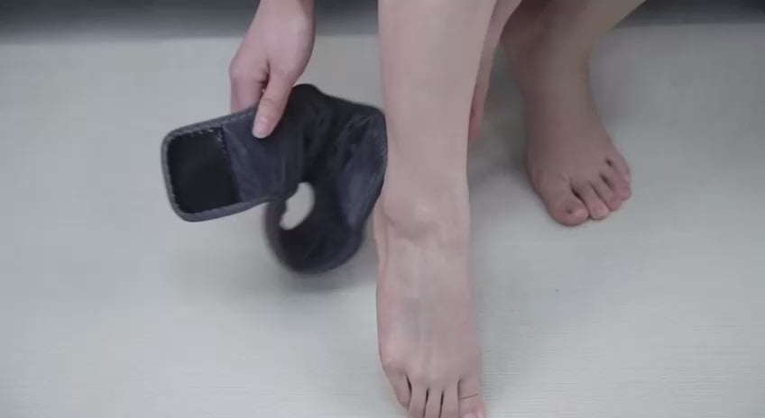 A video of women putting of foot care massager